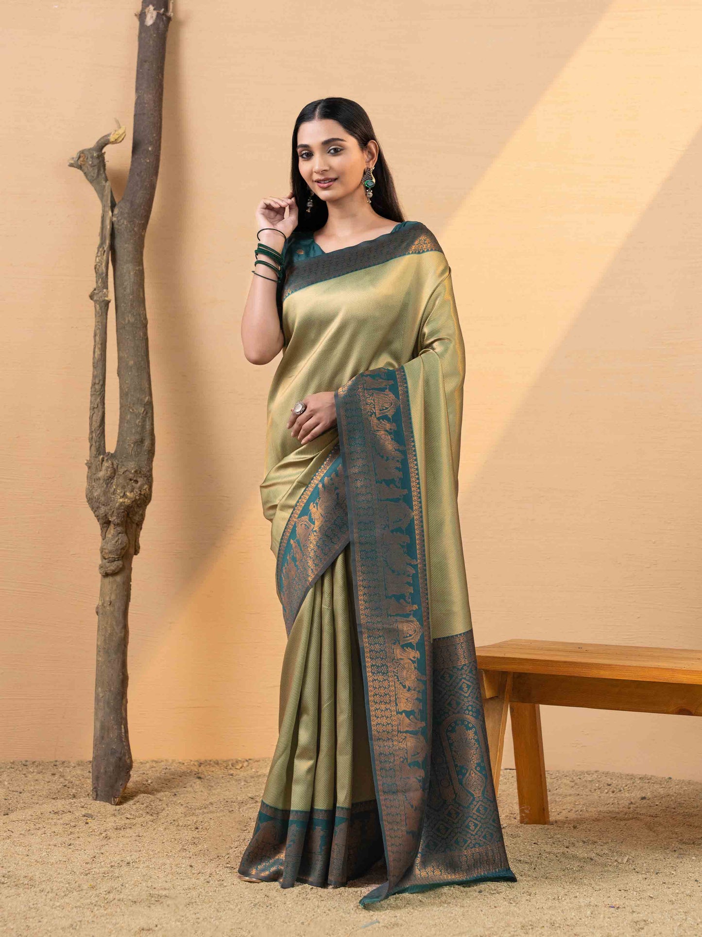 Opulent Olive Gold and Teal Tissue Silk Saree