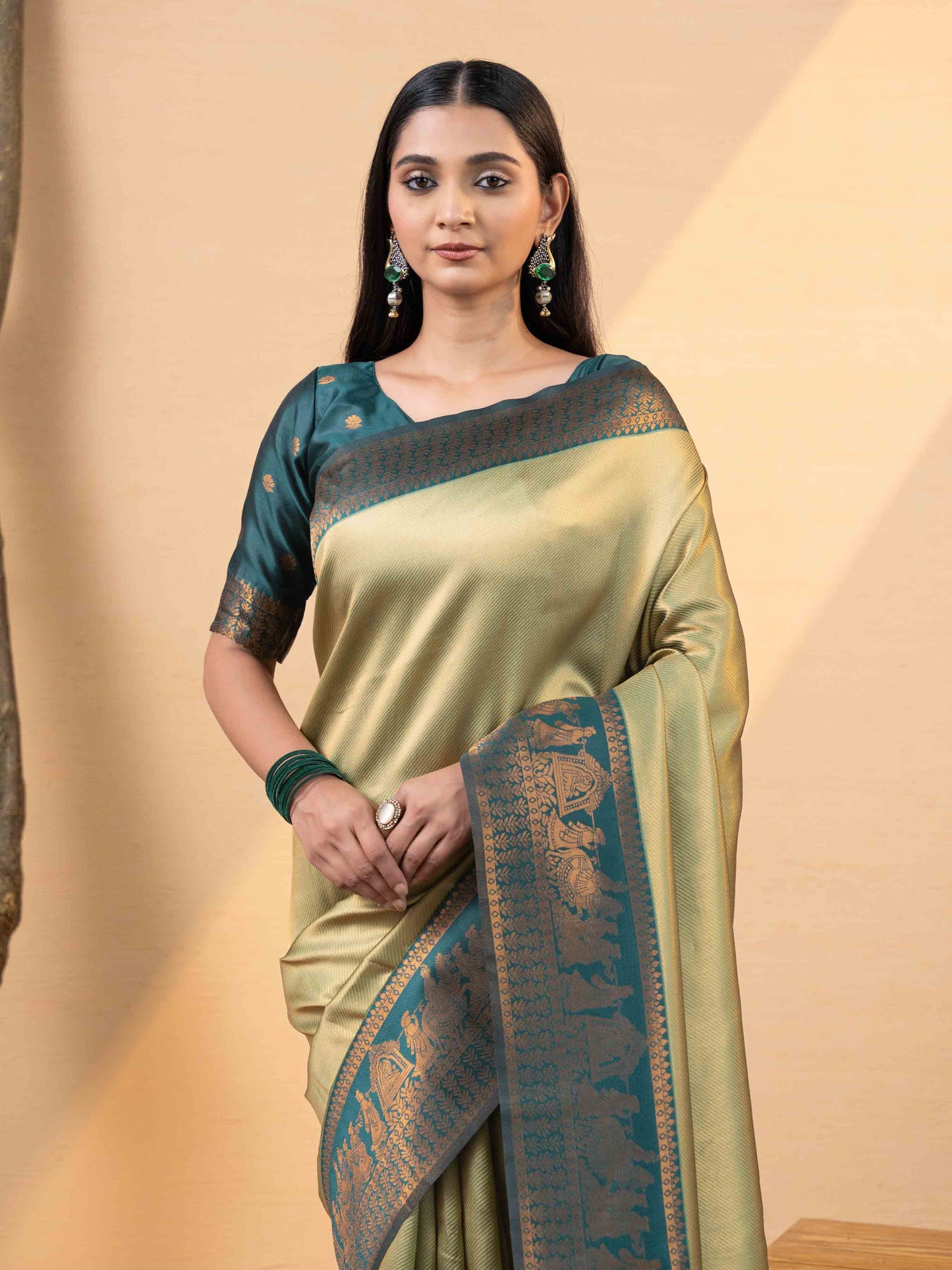 Opulent Olive Gold and Teal Tissue Silk Saree