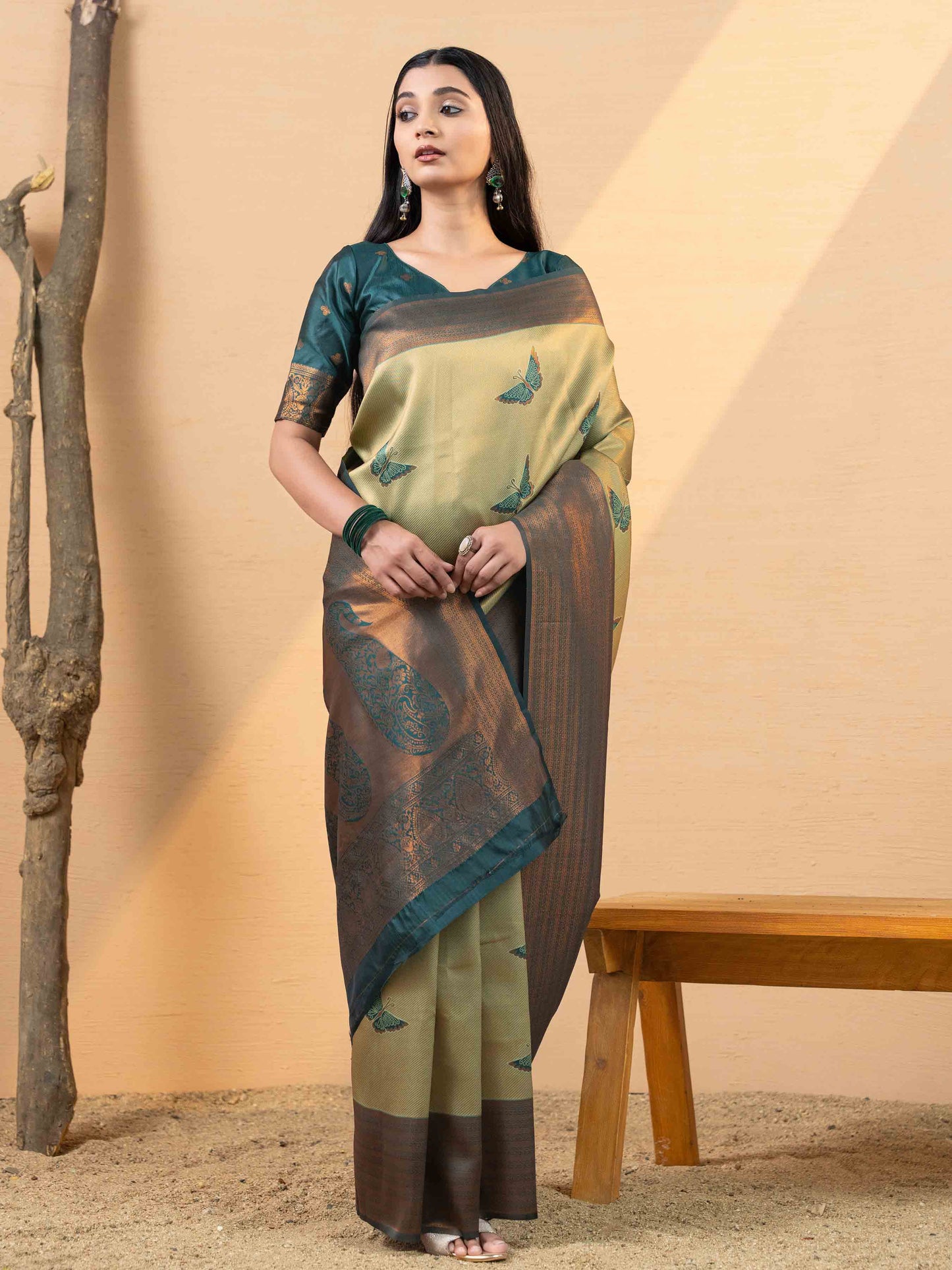 Luxurious Olive Gold and Teal Tissue Silk Saree
