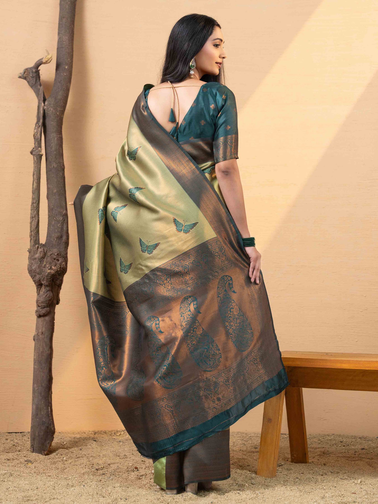 Luxurious Olive Gold and Teal Tissue Silk Saree