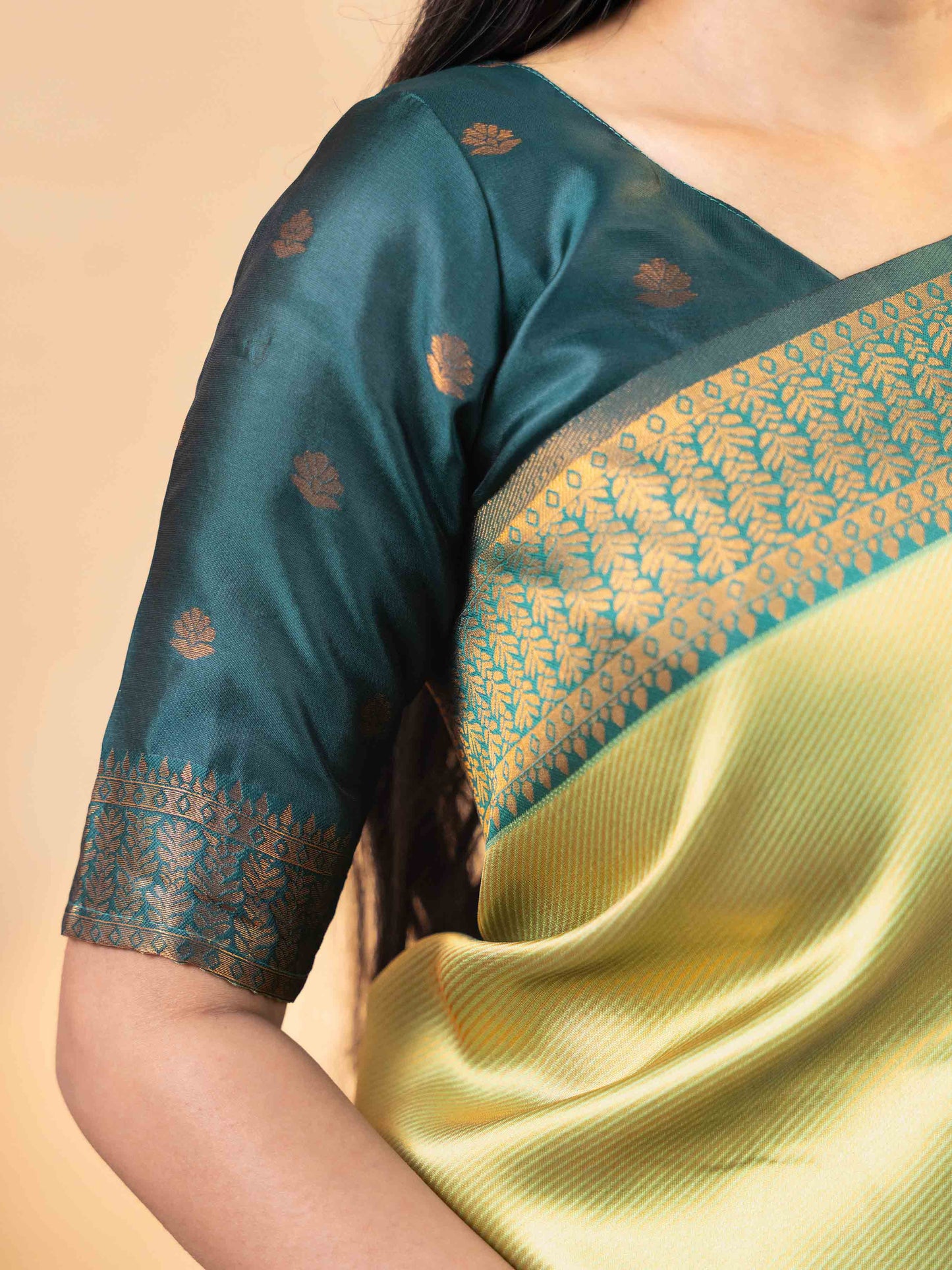 Opulent Olive Gold and Teal Tissue Silk Saree