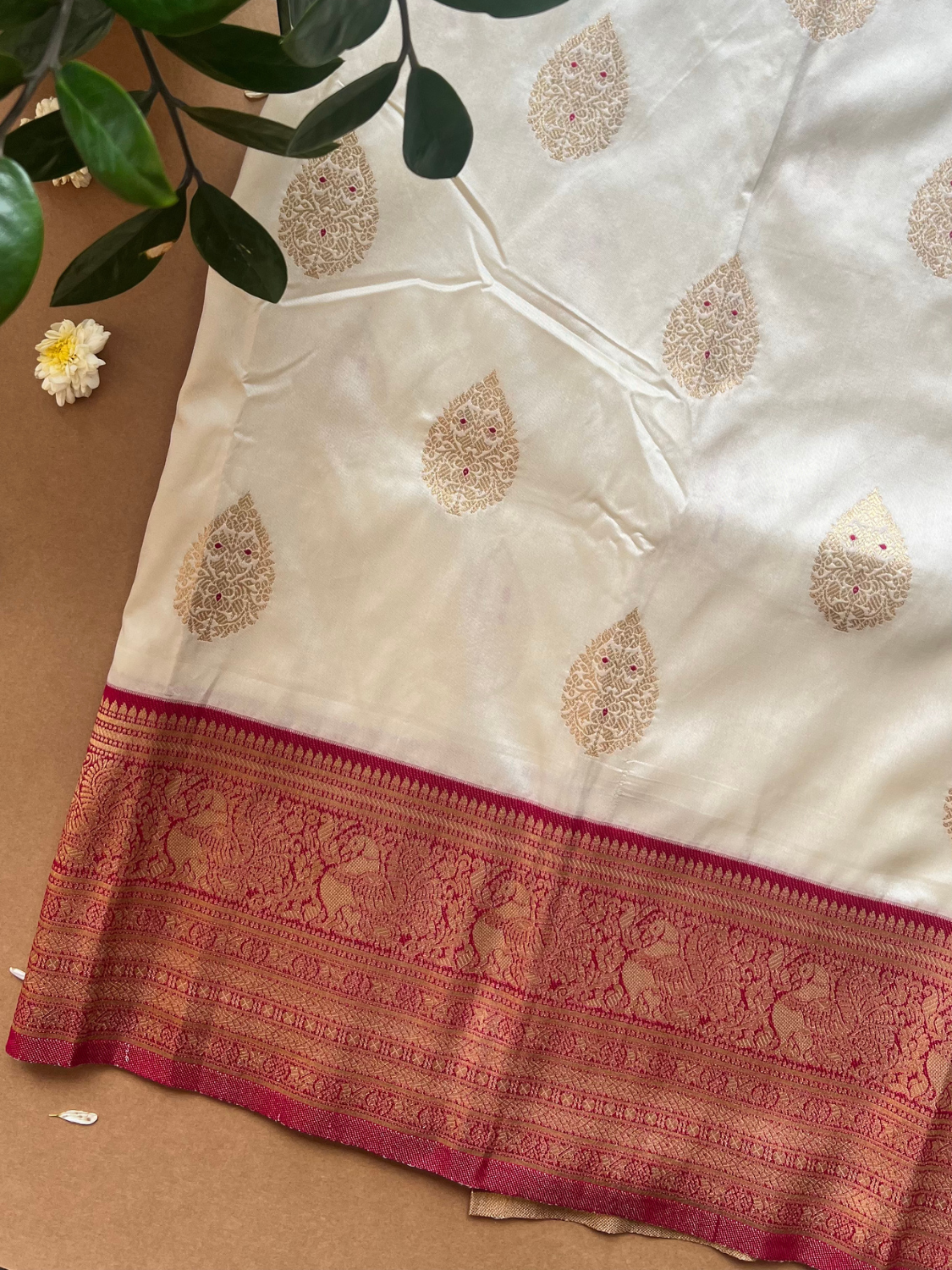 Cream Silk Woven Saree with Gold Buttas & Rich Rani Pink Zari Border