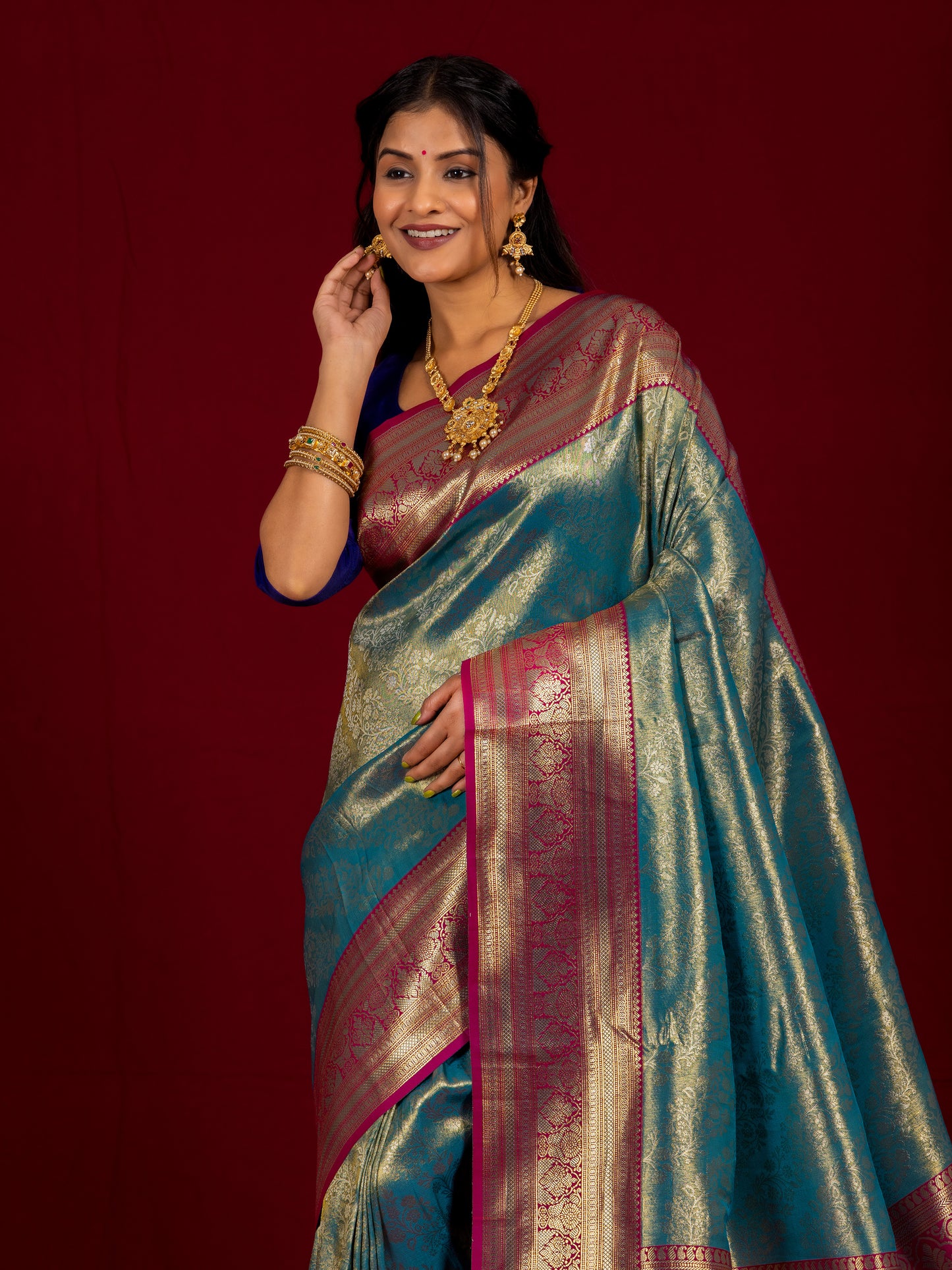Opulent Turquoise and Rani Kanjivaram Pattu Silk Saree