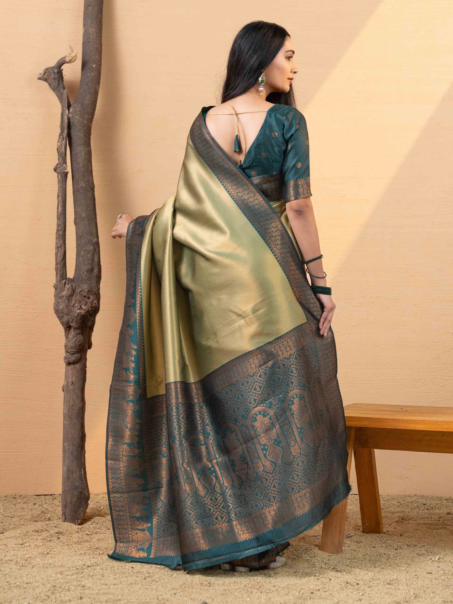 Opulent Olive Gold and Teal Tissue Silk Saree